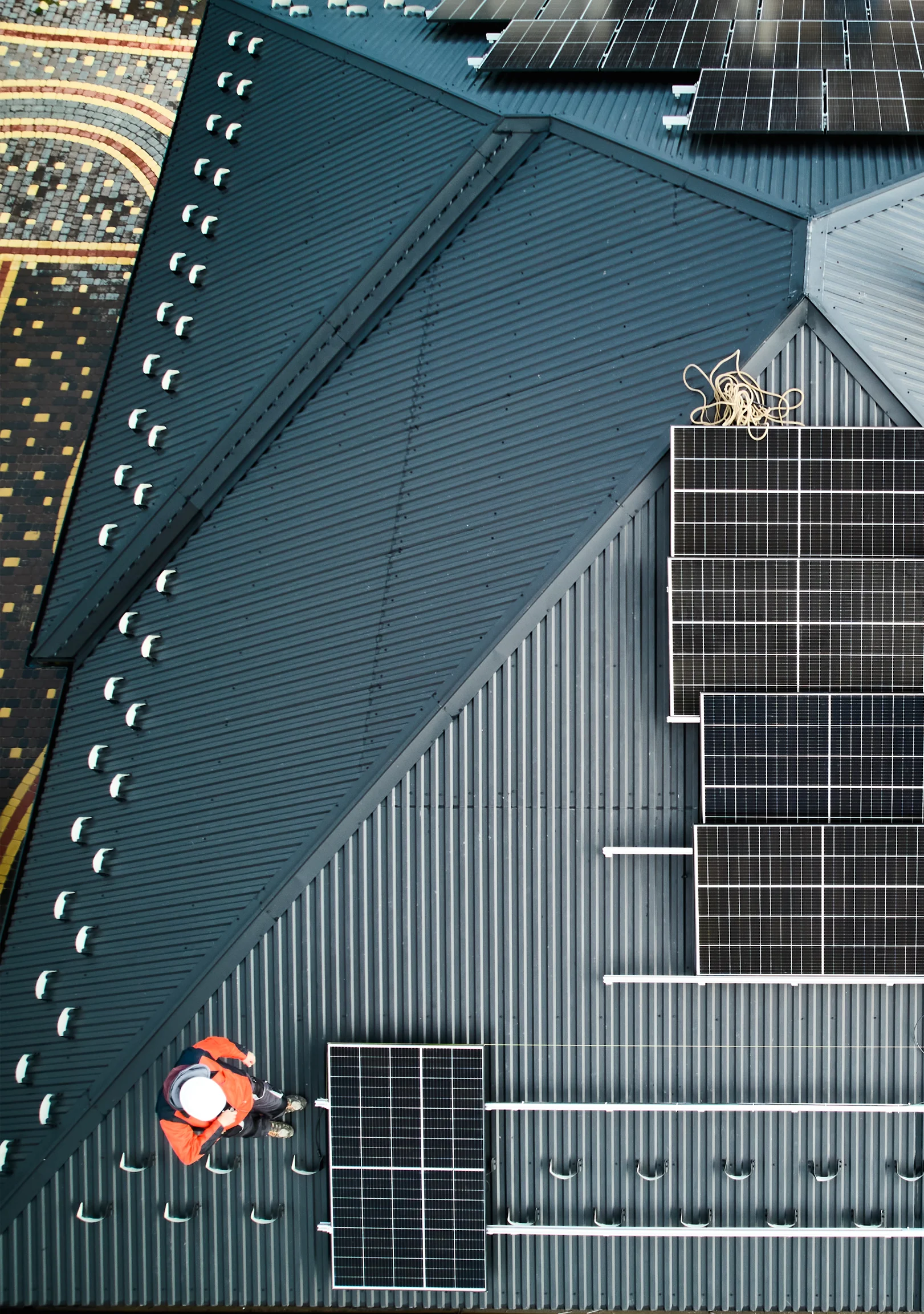 solar-panel-installation-top-view Clean Energy - Solar Panels Being Installed - Top View